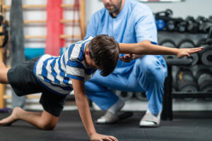 A Doctor and a young boy during a Youth Sports Physicals.